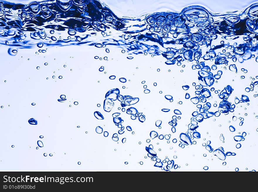 Background with creative bubbles. Blue splashing water