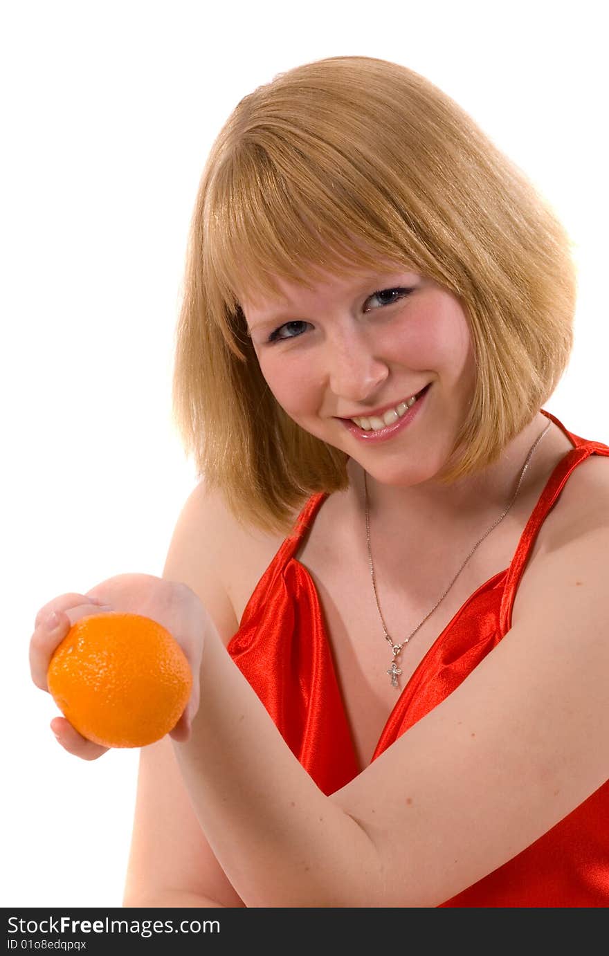 Portrait of young blonde woman with an orange