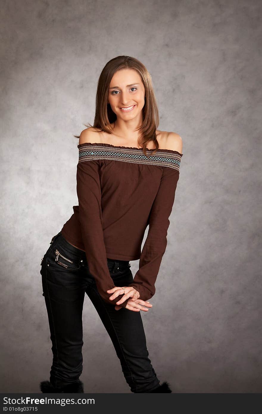 woman on a dark background in a studio. woman on a dark background in a studio