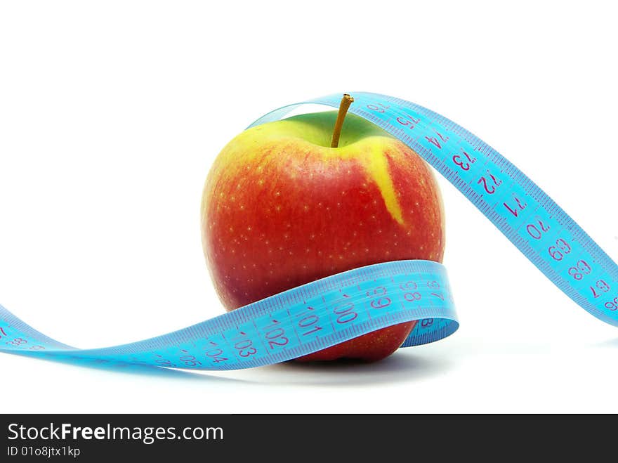 Apple and measuring tape