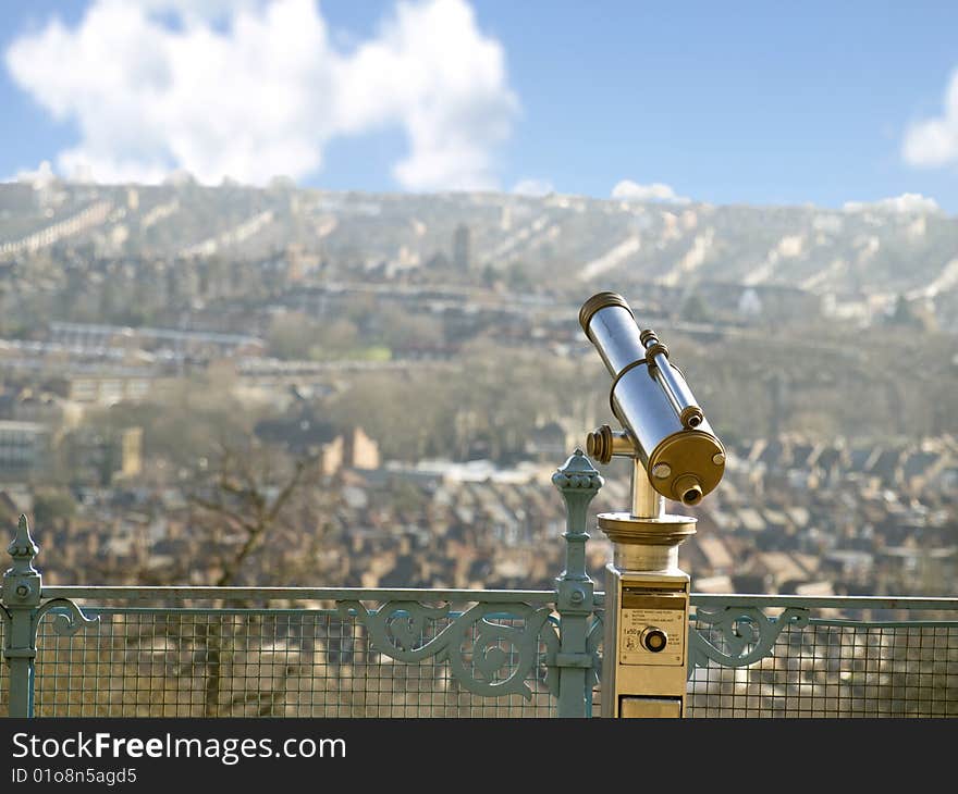 Coin operated viewfinder overlooking scenery