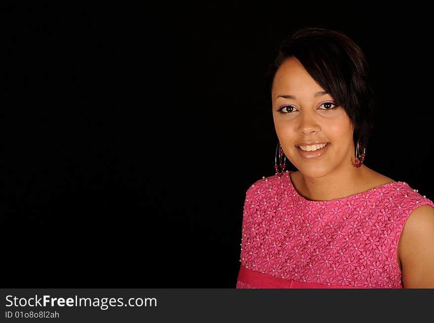 Pretty teenage woman on black background. Pretty teenage woman on black background