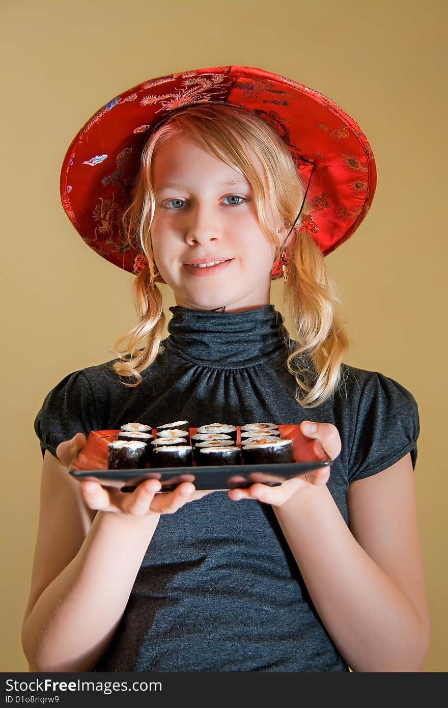 A girl with sushi platter. A girl with sushi platter