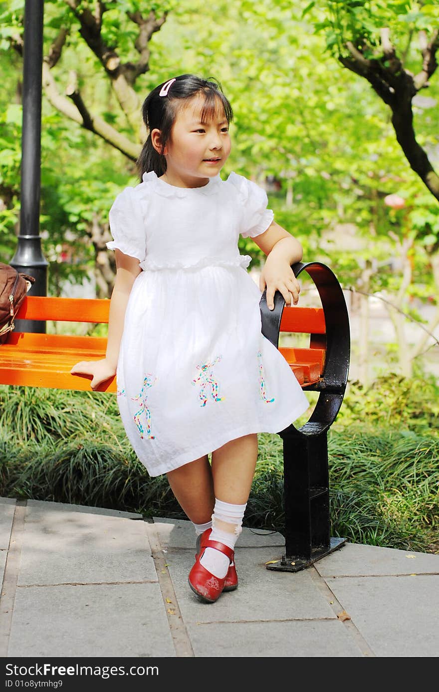 Beautiful little girl in white