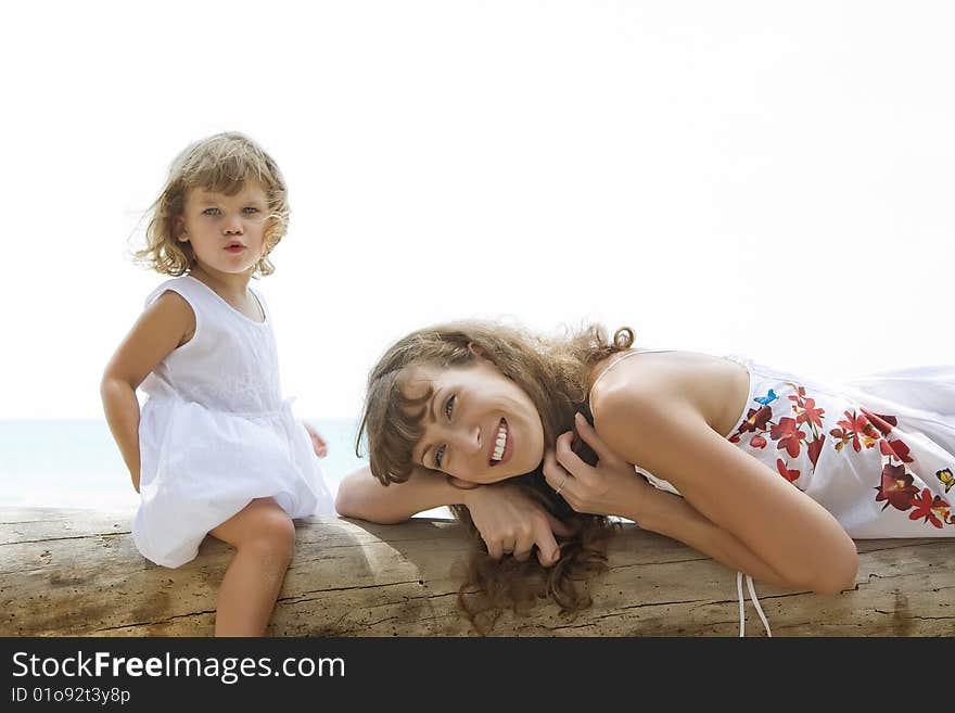 High key portrait of happy mother with baby. High key portrait of happy mother with baby