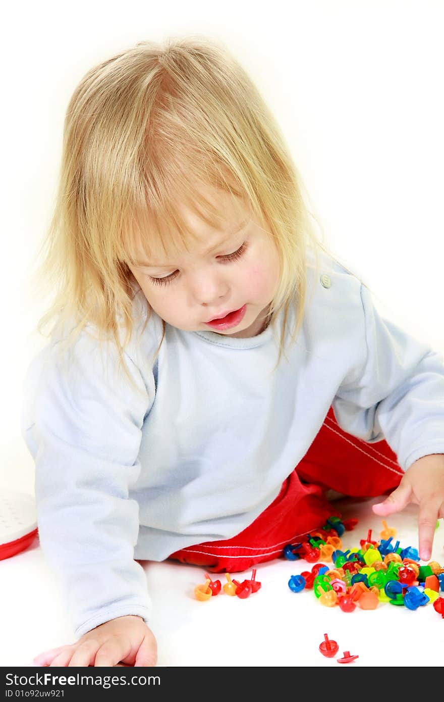 Cute toddler girl over white