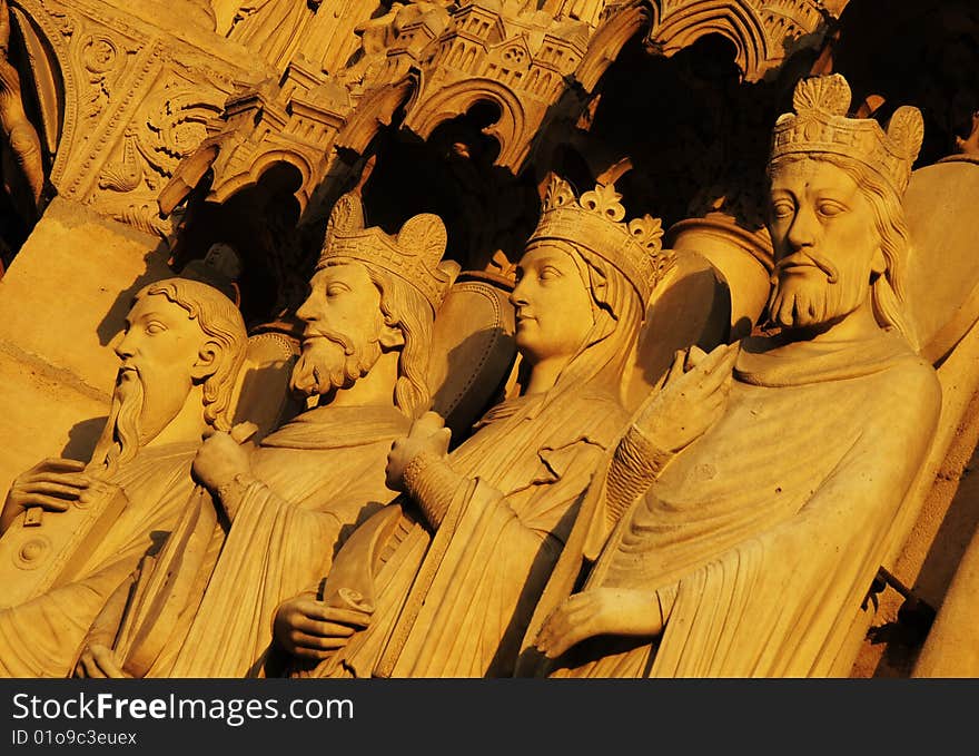 Saint statues with golden color