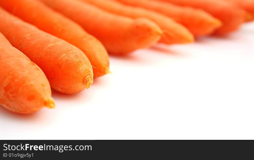 Fresh carrots isolated on white