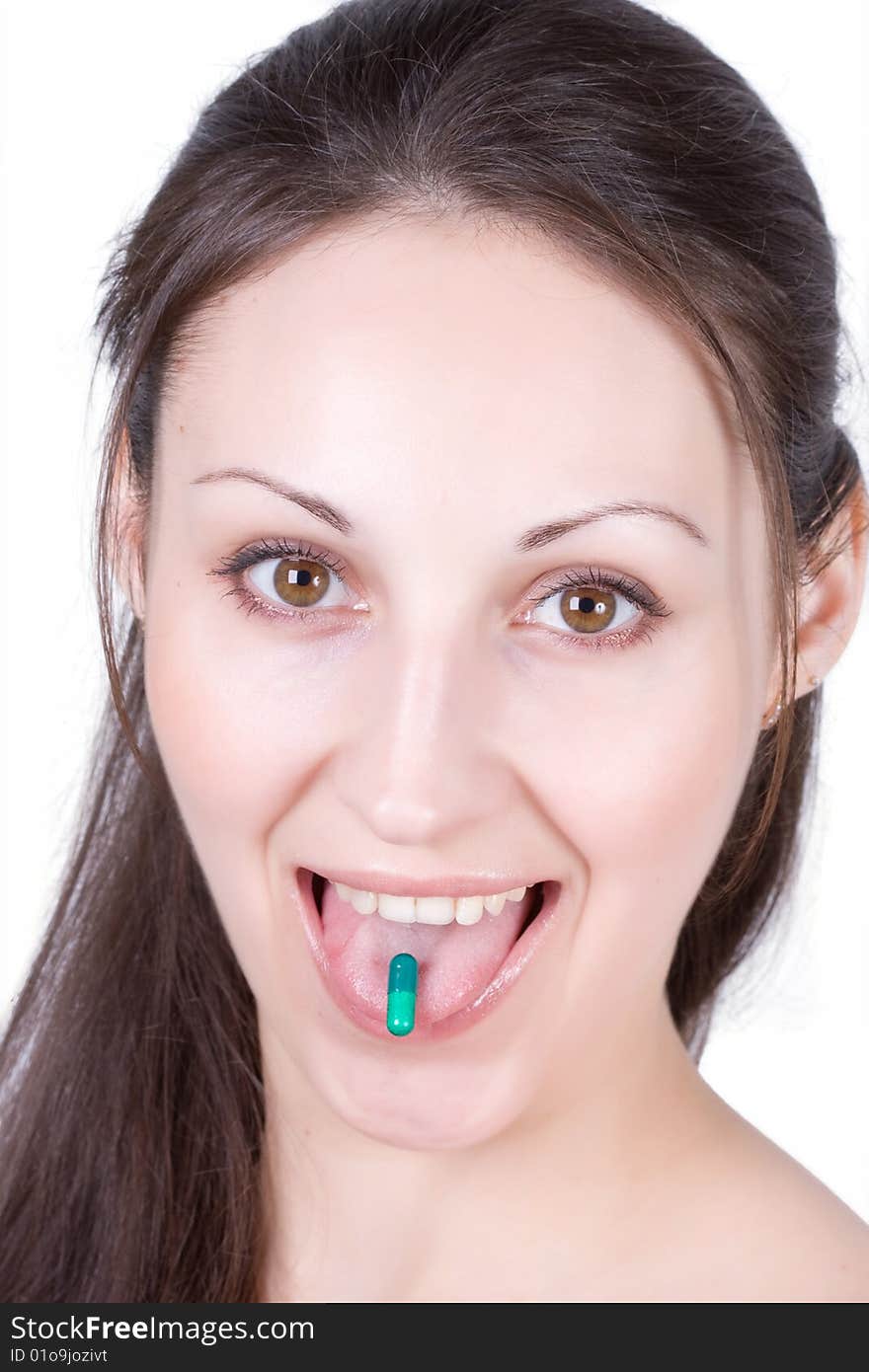 Woman taking pill on a white background