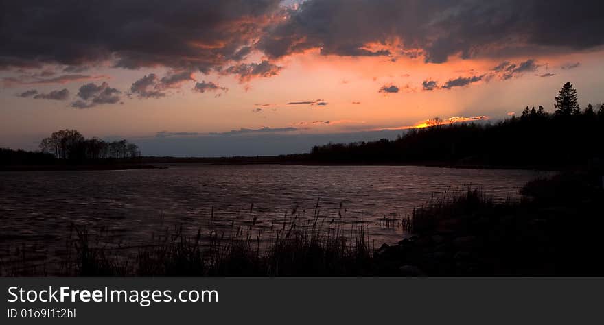 Weather Over Wild Rice Lake At Sunset