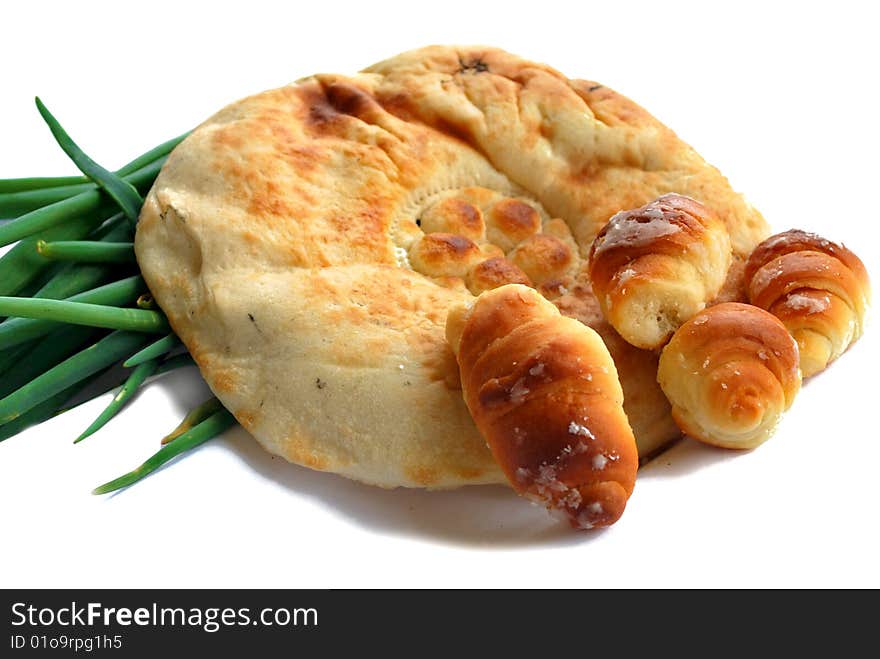 Pita and croissants isolated on white background