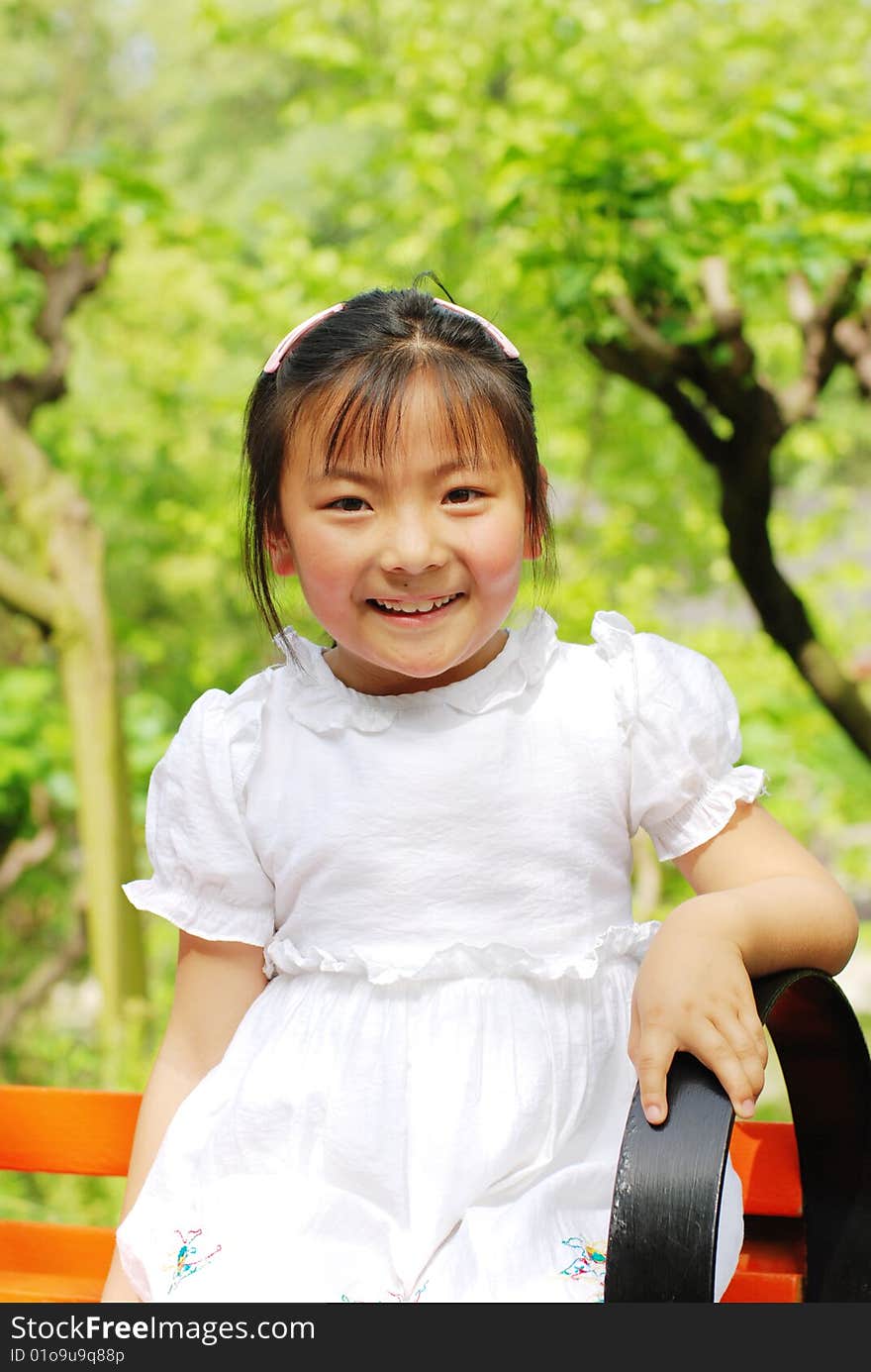 Beautiful little girl in white