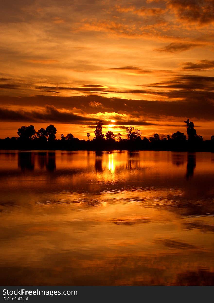 Tranquil sunset over Srah Srang, Angkor Wat, Cambodia. South East Asia. Tranquil sunset over Srah Srang, Angkor Wat, Cambodia. South East Asia.