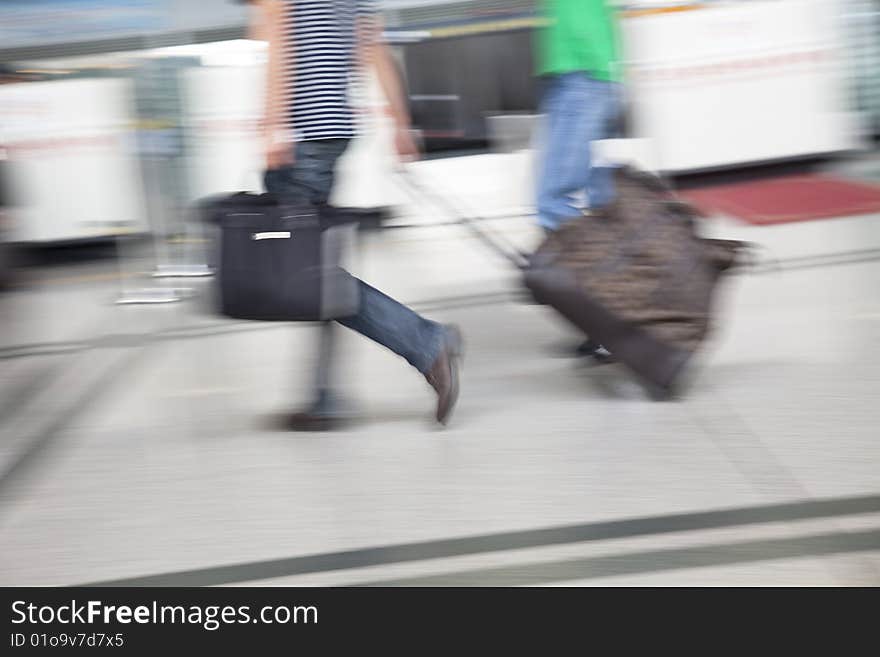 Passenger at the airport, motion blur