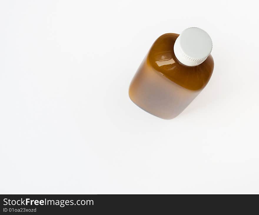 Brown glass mixture bottle isolated on a white background.