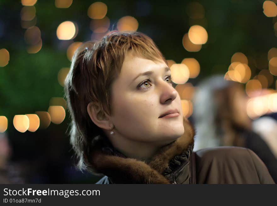 Night portrait of the woman on street