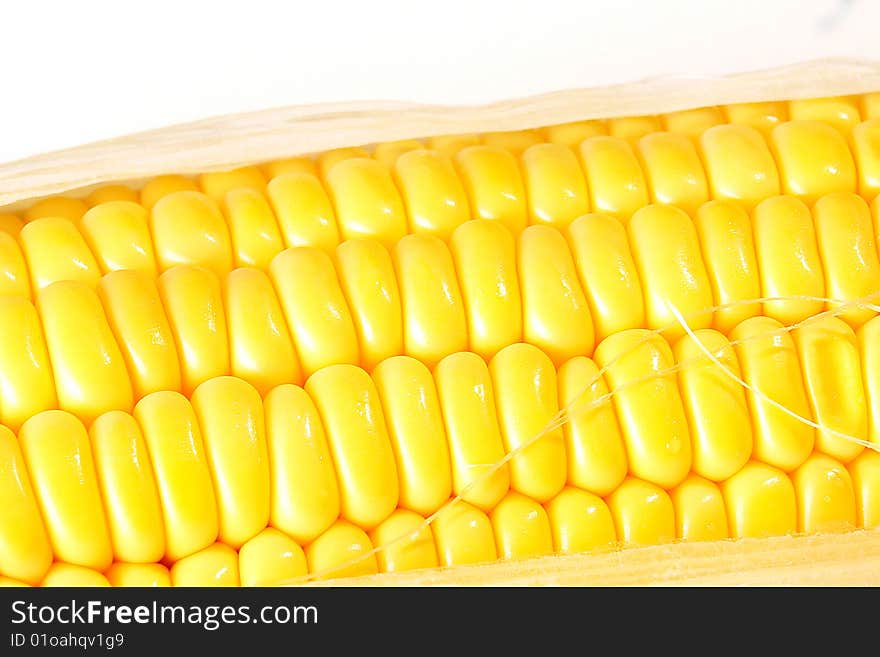 Yellow grains of corn on white background. Food image. Yellow grains of corn on white background. Food image