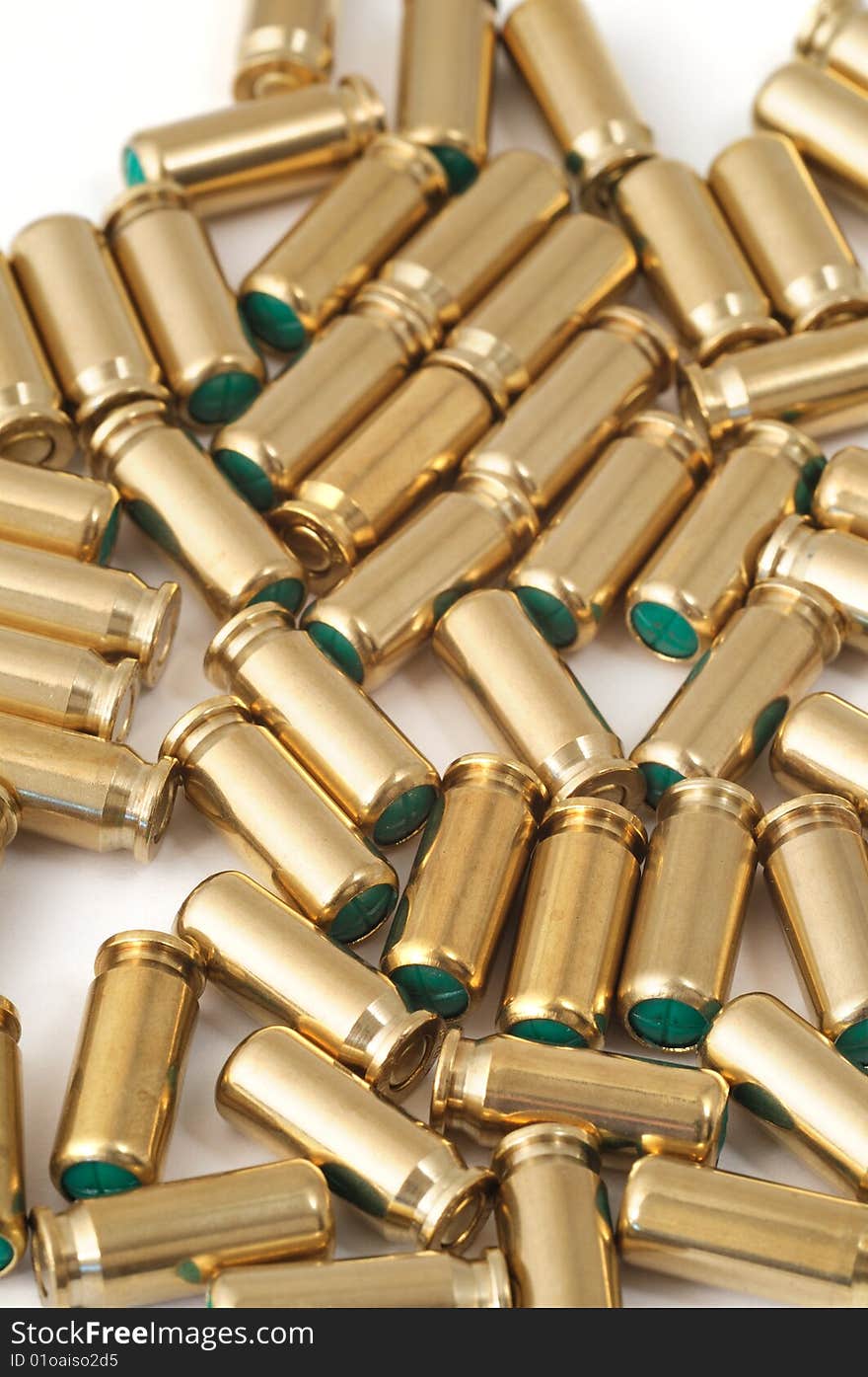 Closeup of gaspistol bullets on white background