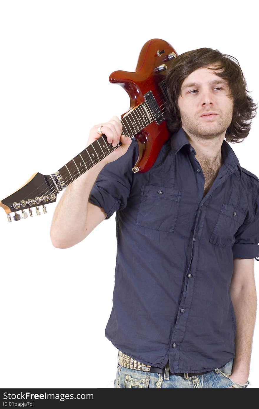 Guitarist holding the guitar on his shoulder