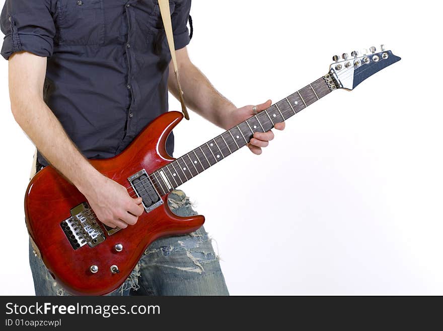 Closeup of a guitarist playing his guitar