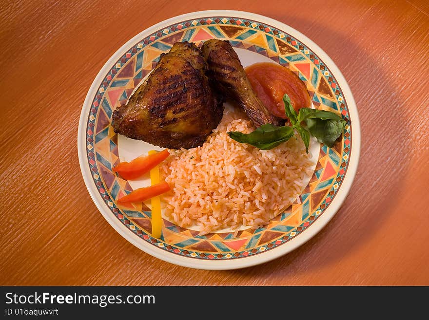 Roasted chicken with rice, studio shot