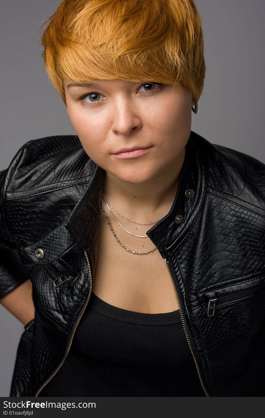 Young beautiful woman in leatherjacket