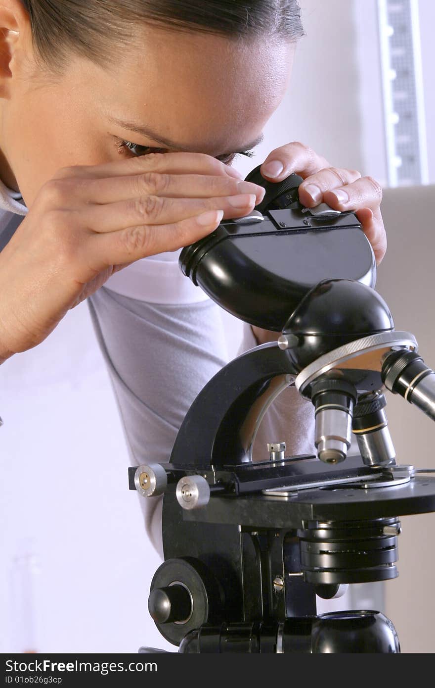 Scientist with Microscope