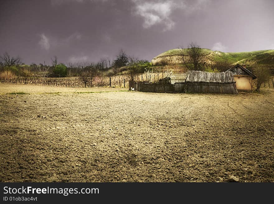 Peasant house at the country in field. Peasant house at the country in field