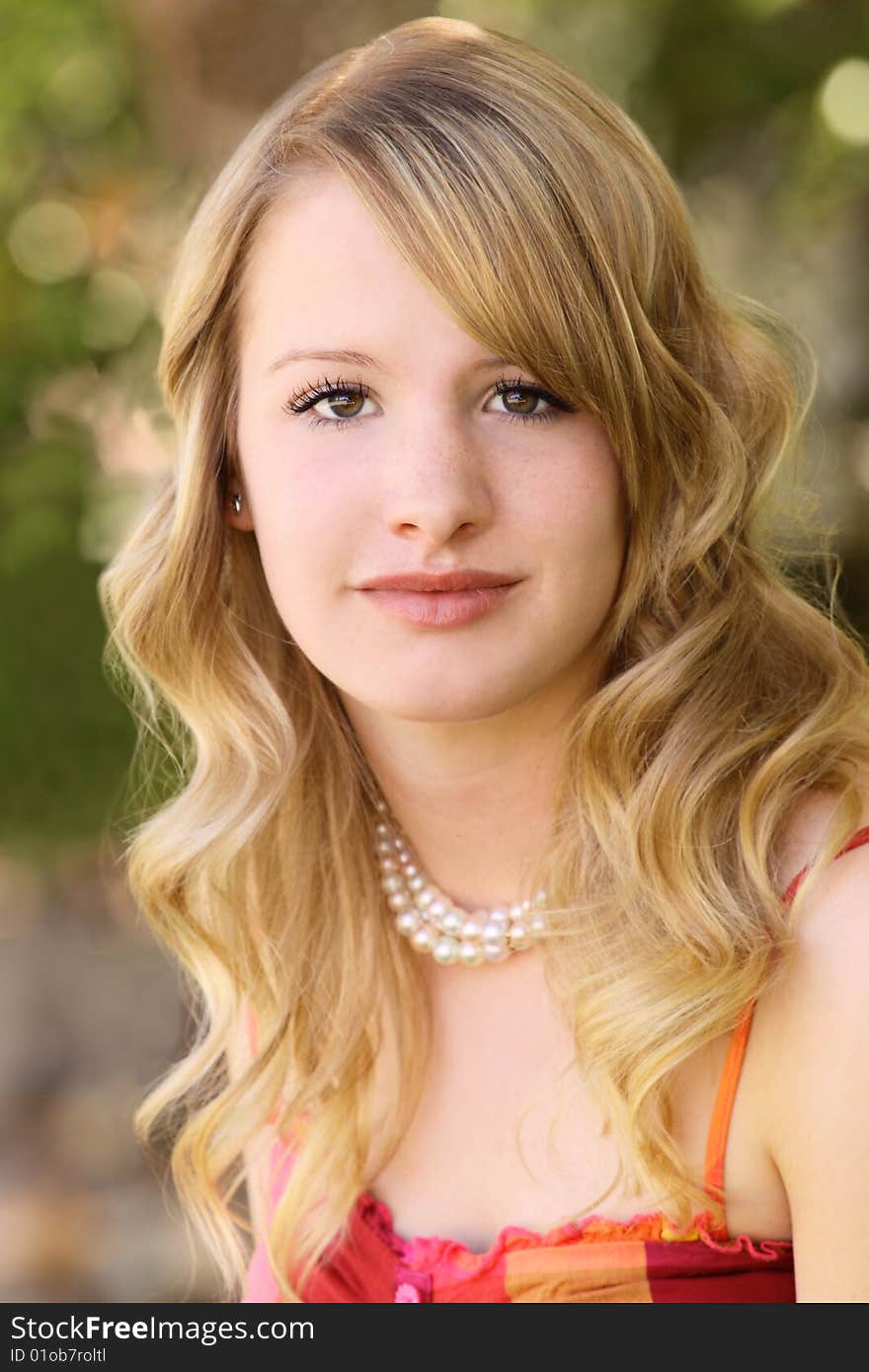 Close-up of pretty teenager looking relaxed