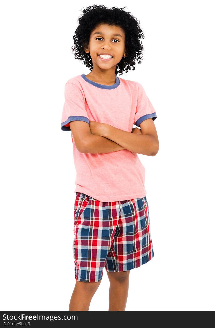 Child standing with his arms crossed isolated over white