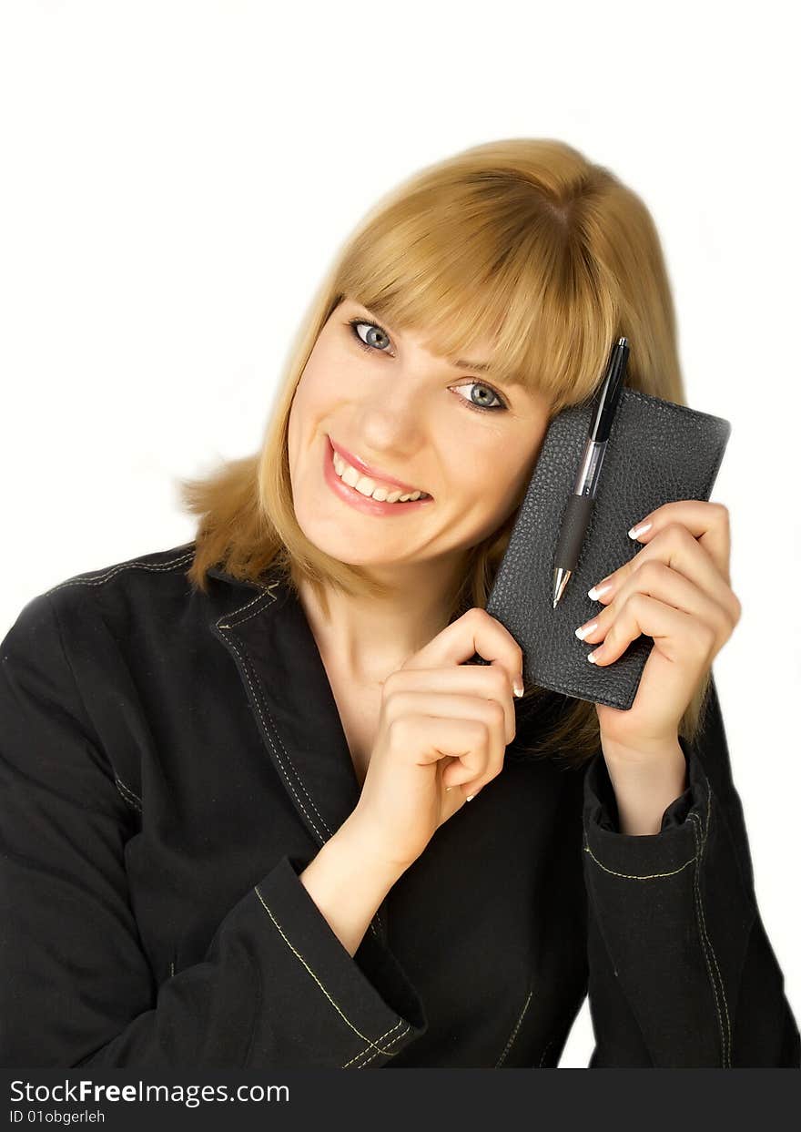 The beautiful businesswoman in a black jacket. The beautiful businesswoman in a black jacket