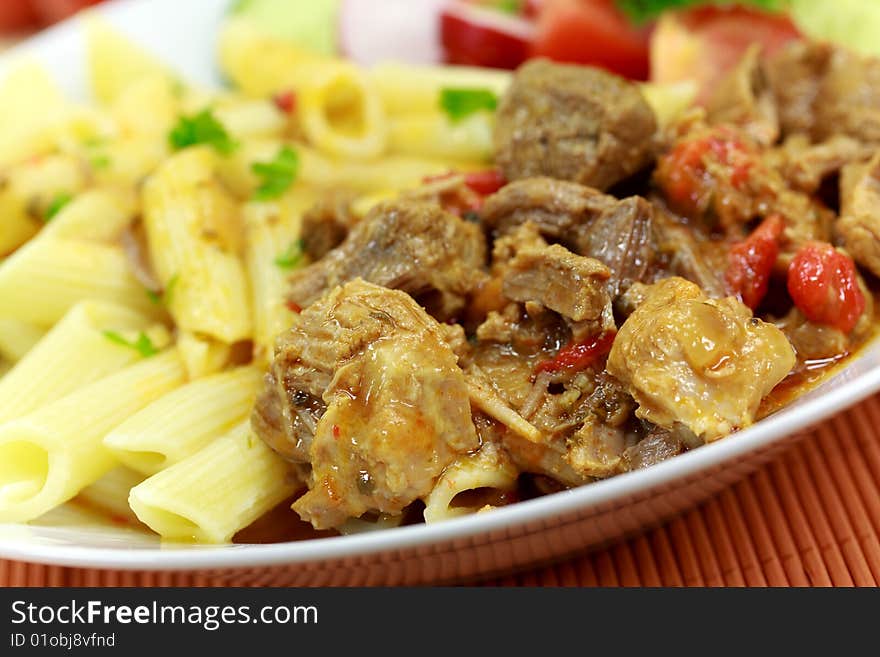 Goulash meat with penne noodles