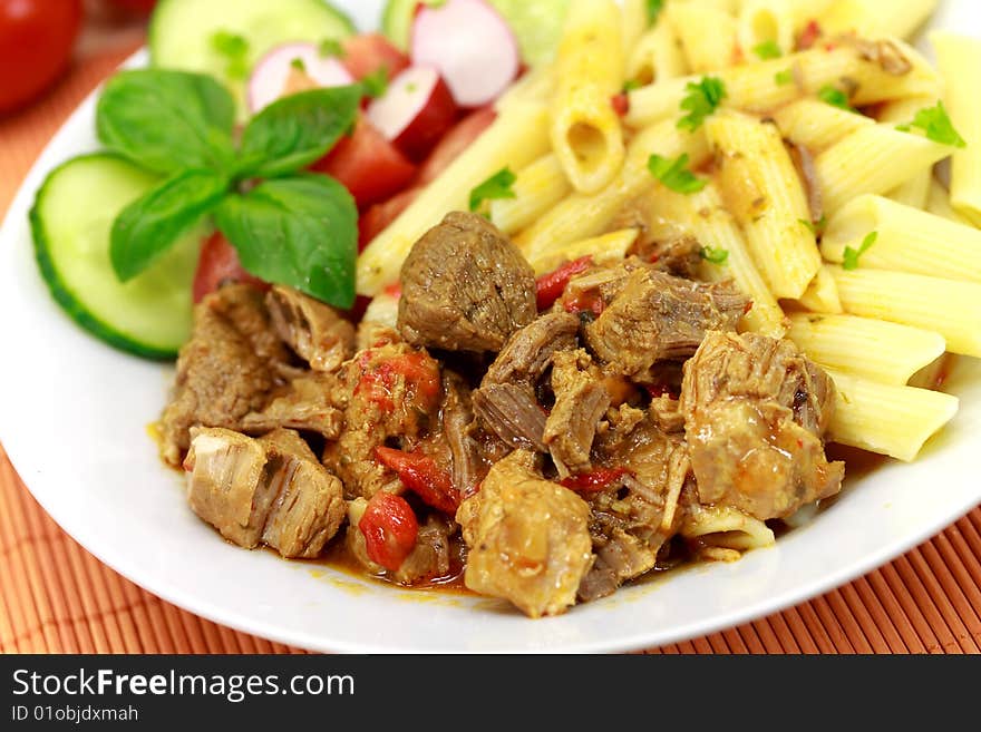 Goulash meat with penne noodles