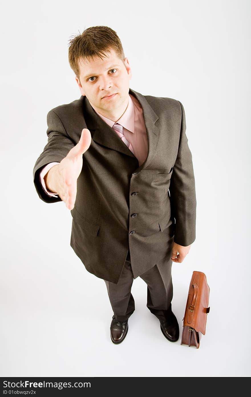 Business man handshake on white background