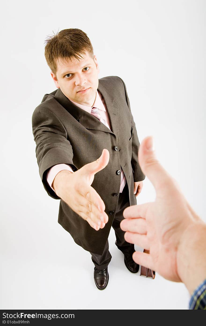 Business man handshake on white background