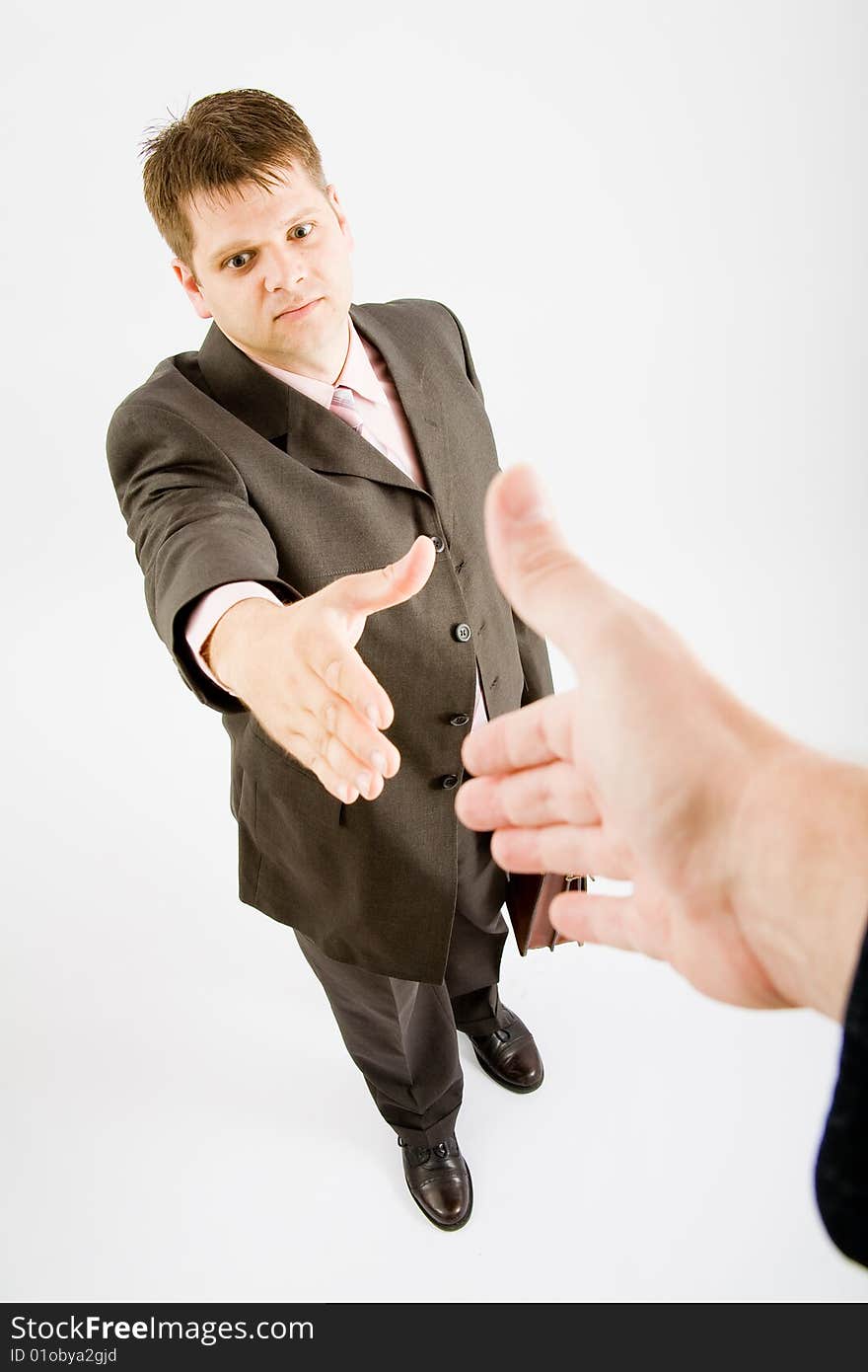 Business man handshake on white background