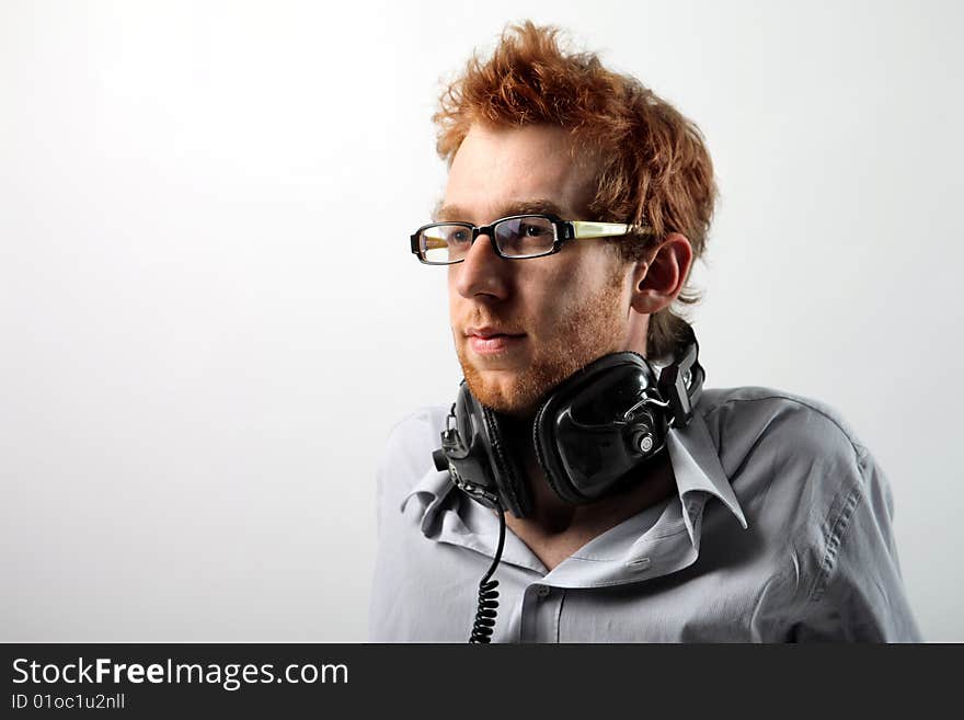 Portrait of funny guy with earphones. Portrait of funny guy with earphones