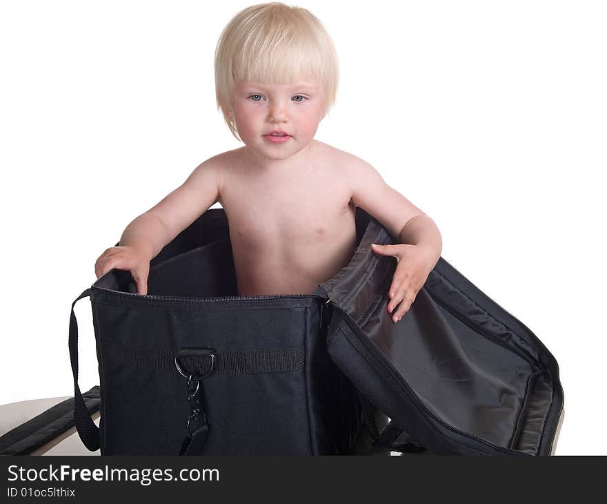 Cute child into large bag. Cute child into large bag