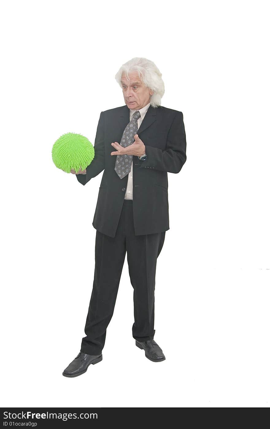 Older man in suit with relax ball. Older man in suit with relax ball