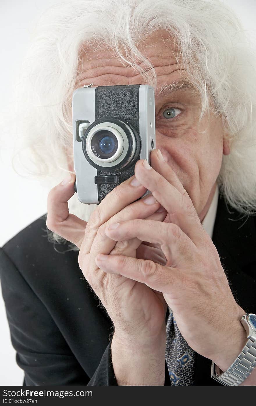 Older man holding a camera