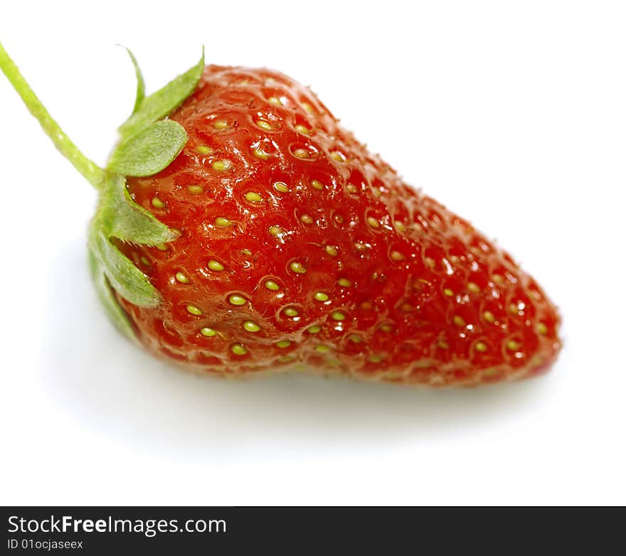 One berry of a ripe strawberry close up