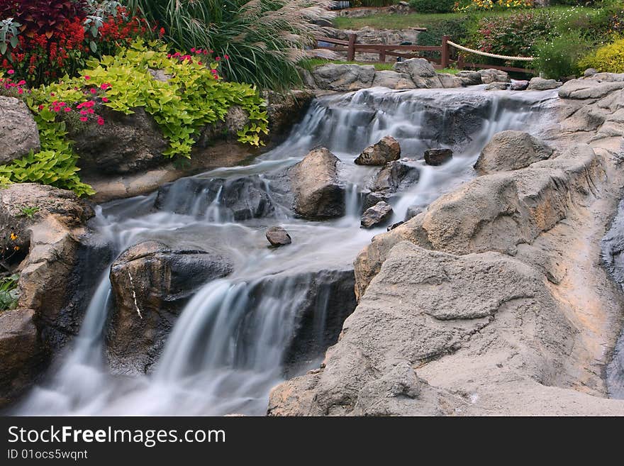 A small waterfall at a miniature gold course. A small waterfall at a miniature gold course.