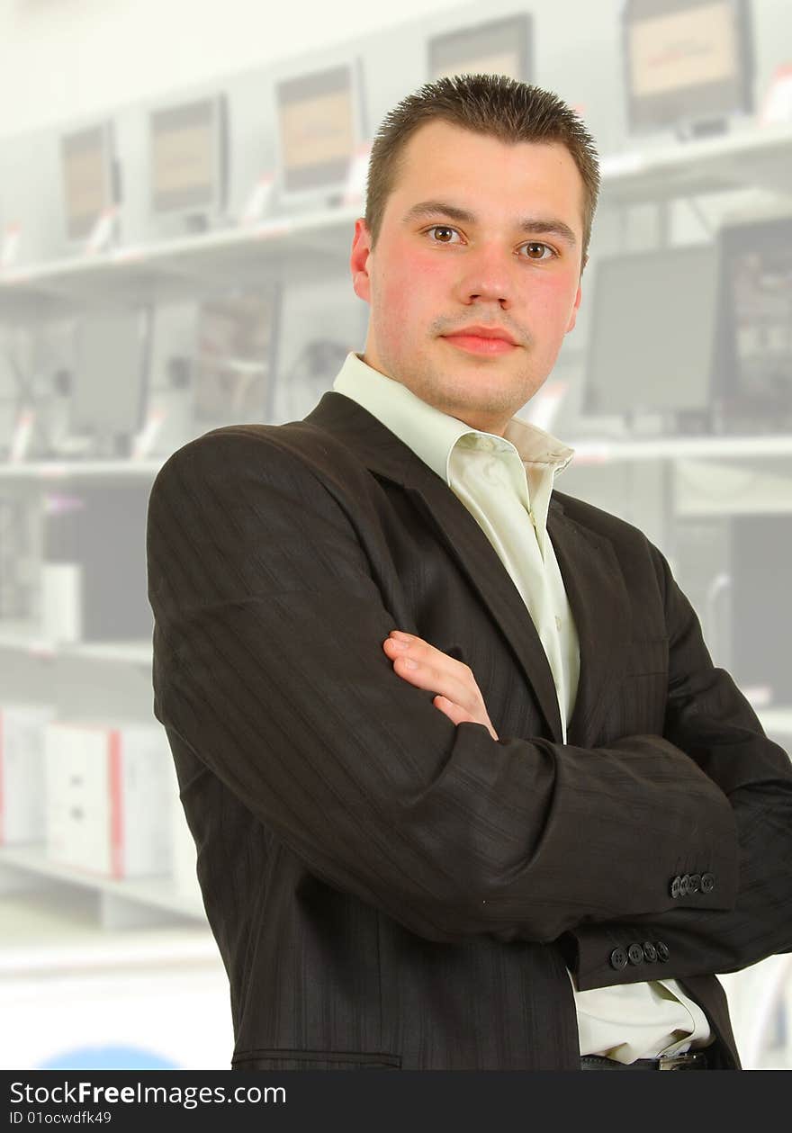 Businessman in front of an offices building.