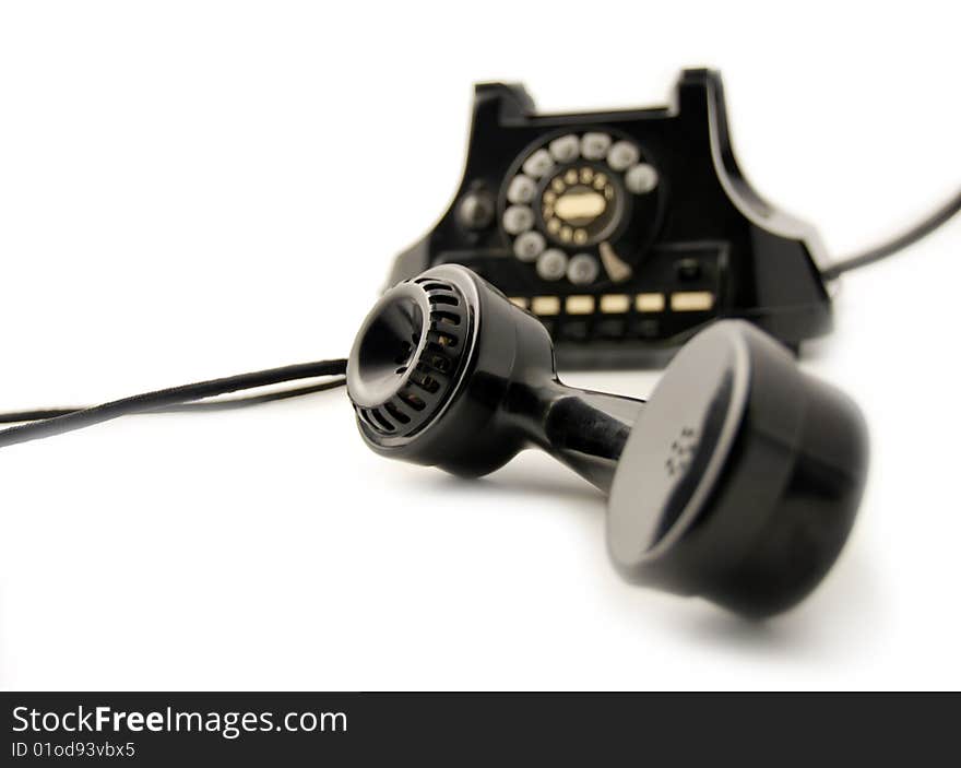 Old vintage telephone isolated in white background. Old vintage telephone isolated in white background