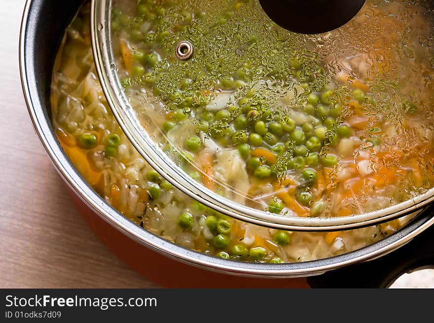 A pot with vegetable soup