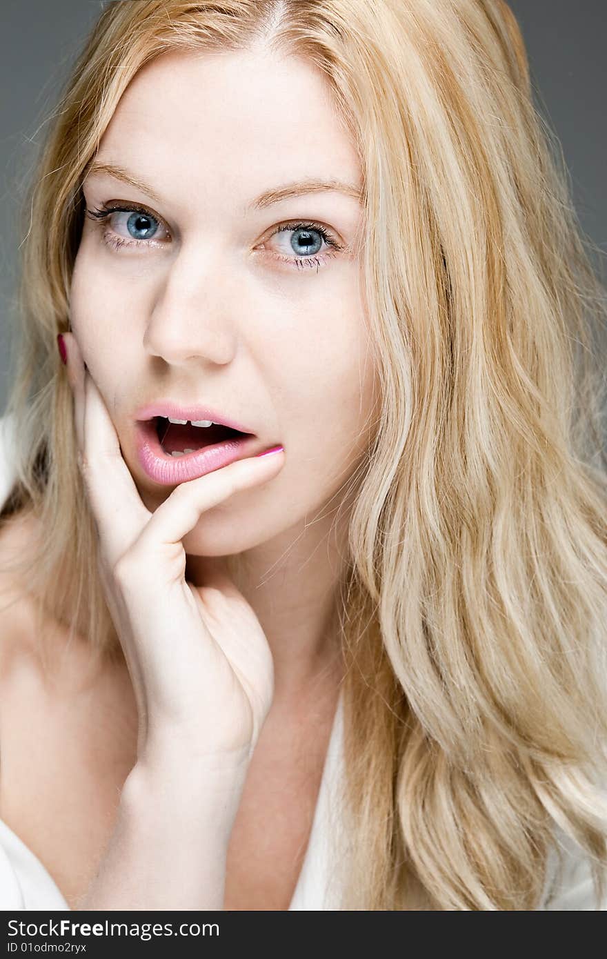 A woman with a surprised look/making a decision. A woman with a surprised look/making a decision.