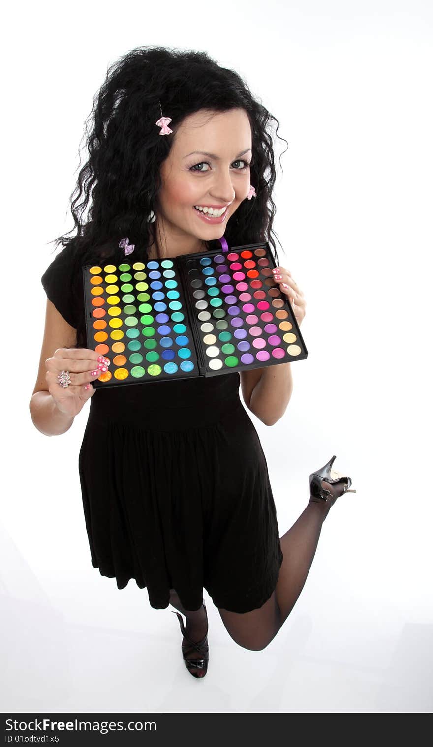 Beautiful lady holding a make-up palette. Beautiful lady holding a make-up palette