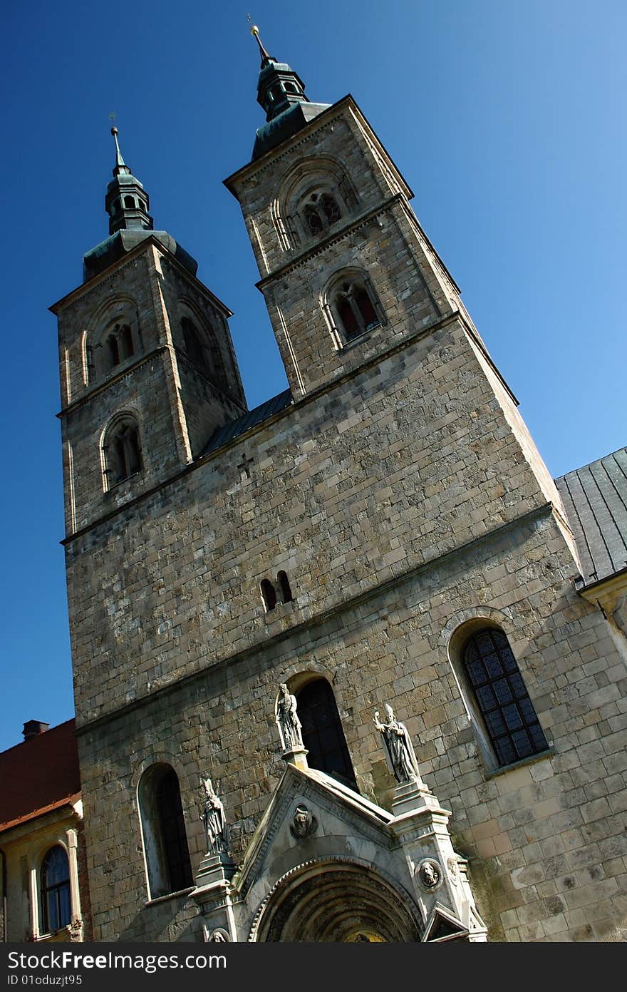 Stone tower of the Gothic monastery in Bohemia.