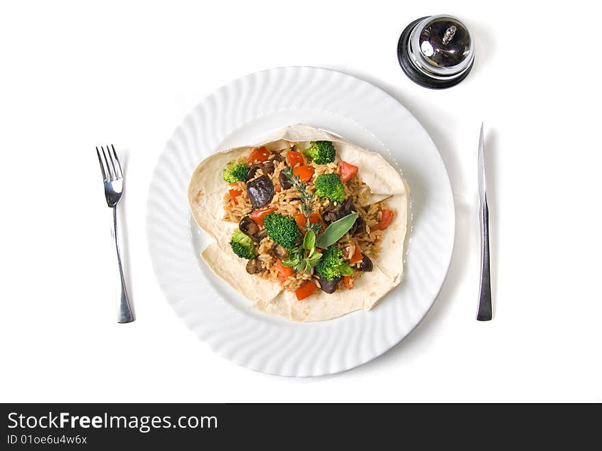 Risotto with fork, knife isolated on white