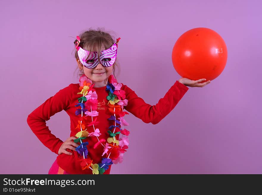 Girl in the mask with a ball